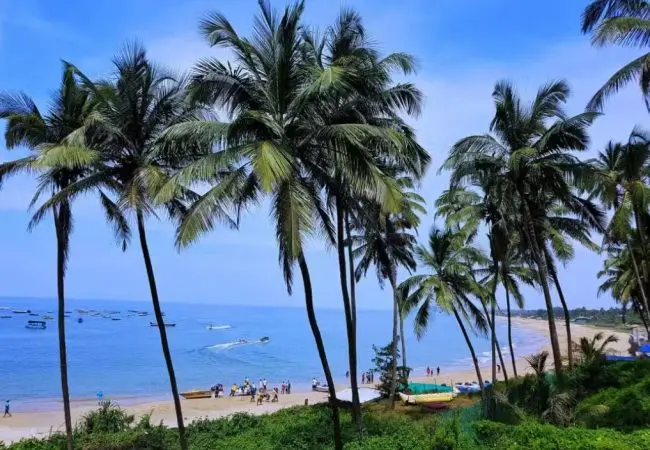 Goa beach holiday package with golden sandy beach and clear blue waters
